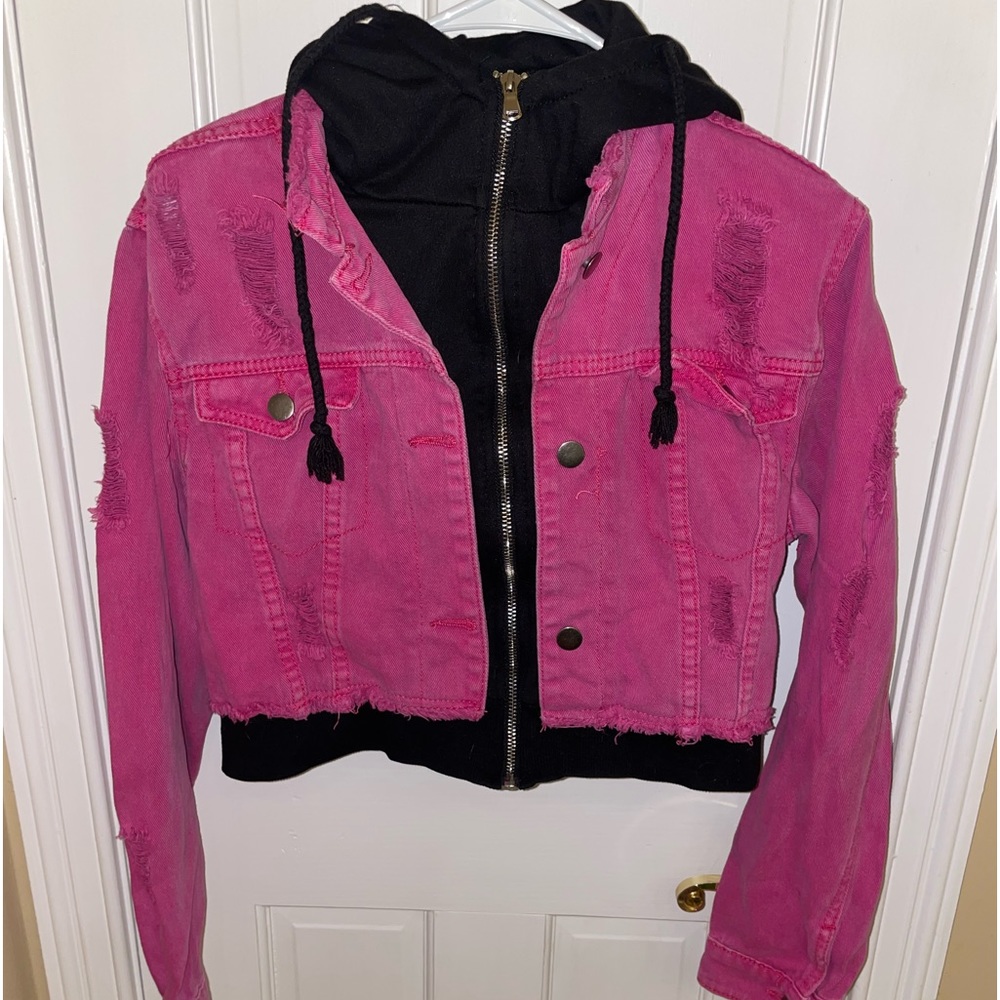 Pink distressed denim jacket